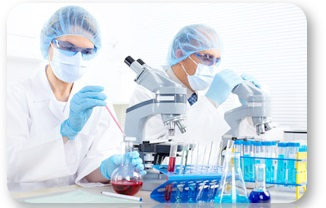 Laboratory workers using a microscope.